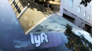 Lyft logo reflected in windscreen