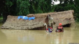 Nepalese army personnel rescue flood victims at Nawalparasi, around 200 km west of Kathmandu on July 26th