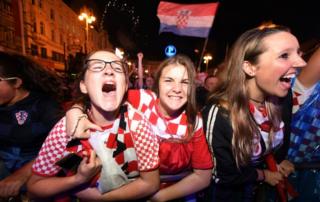   Croatian fans celebrate a goal by observing Croatia -V-England on the main square of Zagreb 