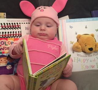 It's not just school kids who join in on World Book Day. Check out this little one dressed up as Piglet from Winnie the Pooh