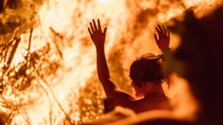 In pictures: Beltane Fire Festival welcomes in the summer - BBC News