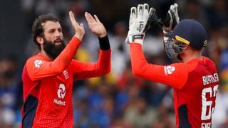 Moeen Ali and Jos Buttler celebrate a wicket