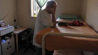 A prisoner in a cell
