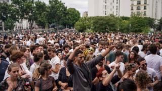 People attending an event for Fete de la Musique in Paris