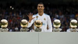 Cristiano Ronaldo with his 5 Ballon d'Ors