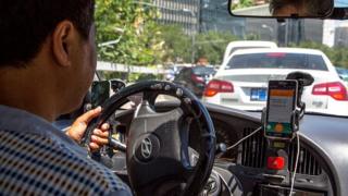 Conductor con la aplicación Didi Chuxing