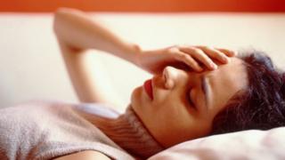 woman with a migraine
