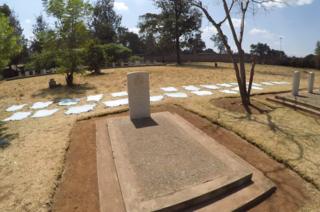 Kairokor cemetery in Nairobi where cow hides surround the memorial.