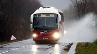 Bus going through flood