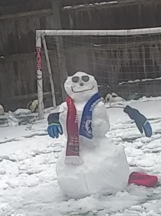snowman with scarf round his neck