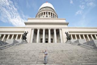 Eusebio Leal delivers a speech in front of El Capitolio, the National Capitol Building, for the unveiling of the cover of the dome on August 30, 2019, in Havana, Cuba.
