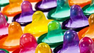 Coloured condoms