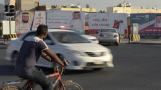 صور مرشحين في الانتخابات البحرينية