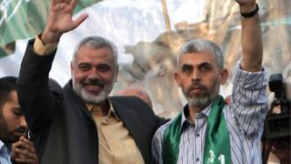 Yehiya Sinwar (right) and Ismail Haniyeh (left)