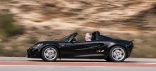 Sports car on road near Sitges, Spain, 2016