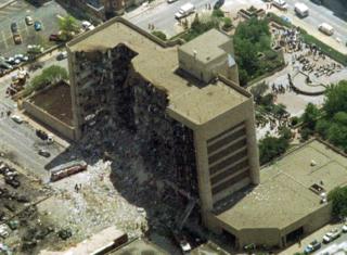 Aerial shot shows giant gouge out of side of Murrah federal building