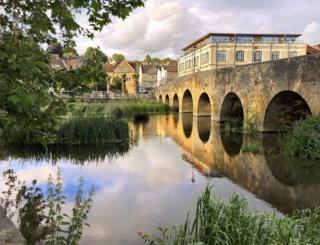 A bridge reflected in water