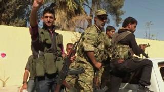 Turkish-backed Syrian opposition forces patrol in Dabiq