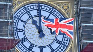 Big Ben clock face showing 11 o'clock