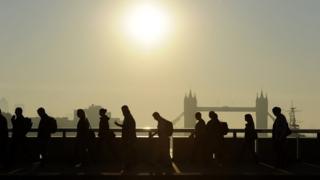 Commuters cross London Bridge