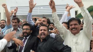 PML-N supporters celebrate party loyalist Abbasi's election as premier last August