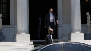 Greek Prime Minister Alexis Tsipras (C, back) leaves his office in Athens, Greece, 09 July 2015