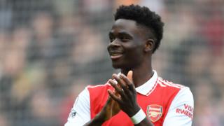 Bukayo Saka applauds fans