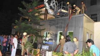 Firefighters try to douse a fire that broke out in the Intensive Care Unit (ICU) of SUM hospital in Bhubaneswar, Orissa, India, 17 October 2016.