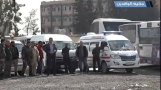 Syrian relate TV aired stay from an evacuation hall in Jap Ghouta