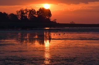 Sunset over water