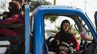 Families flee northern Syria