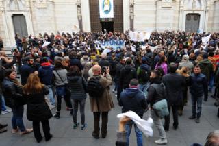 Protesters outside the cathedral in Naples, 5 March