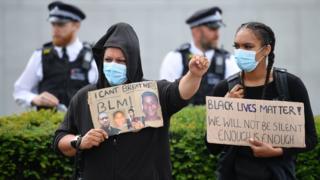 Protesters gather near US Embassy in south London on Sunday 7 June
