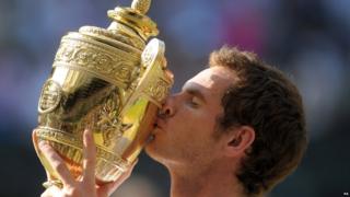 Andy Murray holding Wimbledon trophy