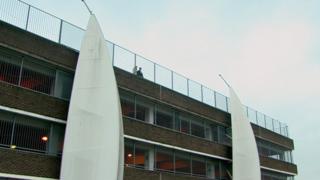 Innes's parents on the top of the car park several years later