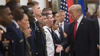 US President Donald Trump meets members of the US military