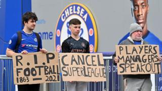 Chelsea fans protest about the European Super League outside Stamford Bridge