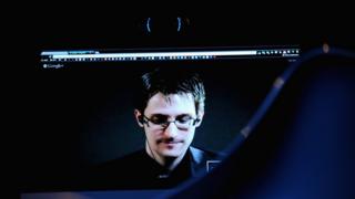 Edward Snowden, shown on a screen