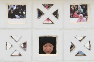 Muslim women attend the Eid al-Adha morning prayer at Dubai's main mosque on 11 August 2019