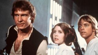 Carrie Fisher with her co-stars Harrison Ford and Mark Hamill