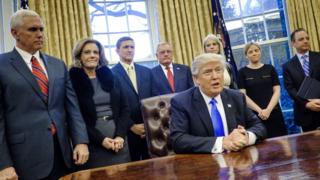 Дональд Трамп после подписания указов