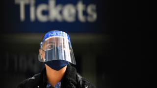 Commuter wearing a facemask