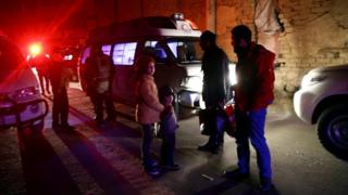 Ambulances and medical workers evacuate critically-ill patients from the besieged town of Douma, Eastern Ghouta, to Damascus, Syria December 26, 2017