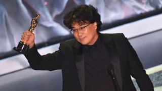 South Korean director Bong Joon-ho accepts the award for Best International Feature Film