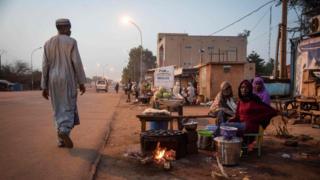 Street vendors sell food in Niger's capital Niamey