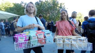Propercorn workers giving out free popcorn at London Fashion Week