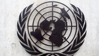 The UN insignia on the United Nations Office in Geneva