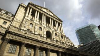 Bank of England building with clouds above