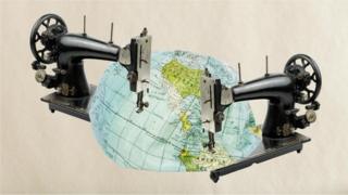 خريطة العالم تحت ذراع ماكينة حياكة