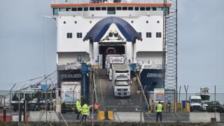 Port inspection staff check freight that has just arrived on the Larne to Cairnryan ferry on March 4, 2021 in Larne, Northern Ireland